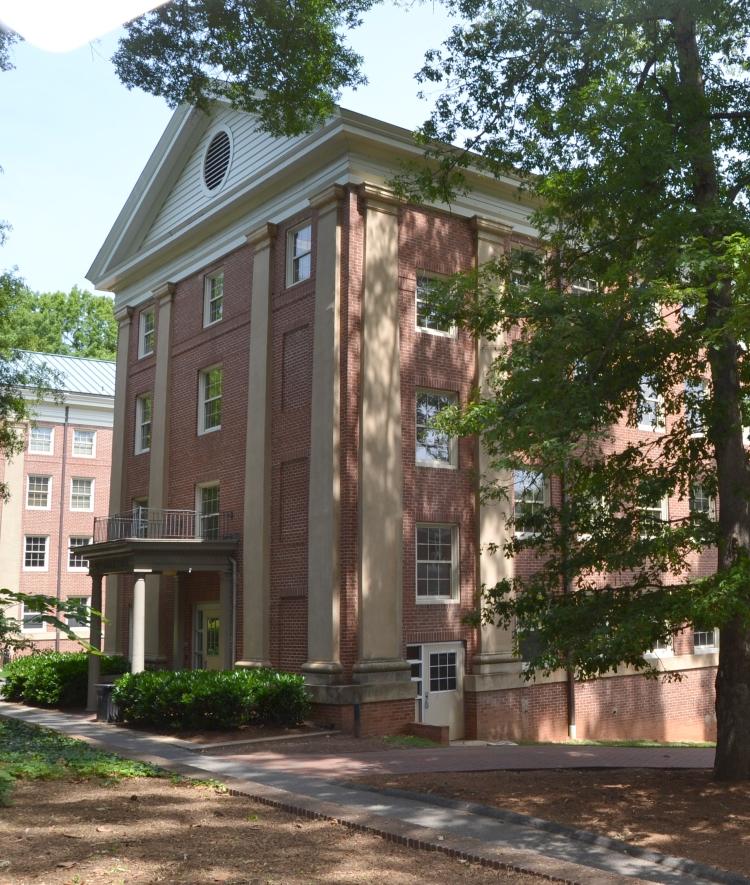 Sentelle Residence Hall, a red brick building surrounded by trees