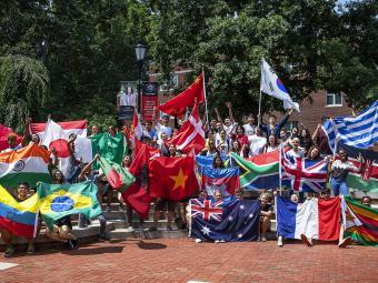 International Student Group with Flags of Many Countries at 桃瘾社区